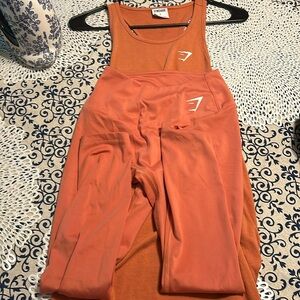 Gymshark size small orange leggings and tank set
